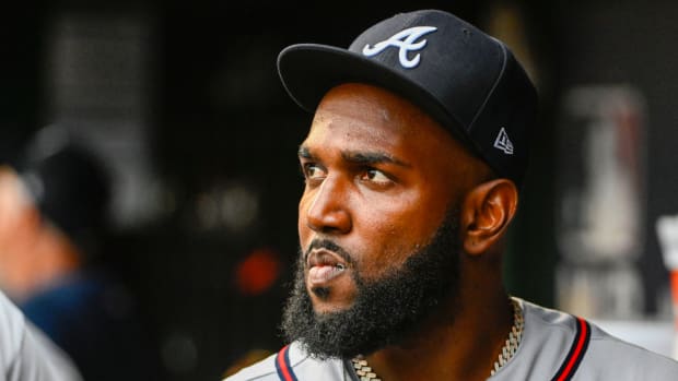 Atlanta Braves designated hitter Marcell Ozuna (20) in the dugout.
